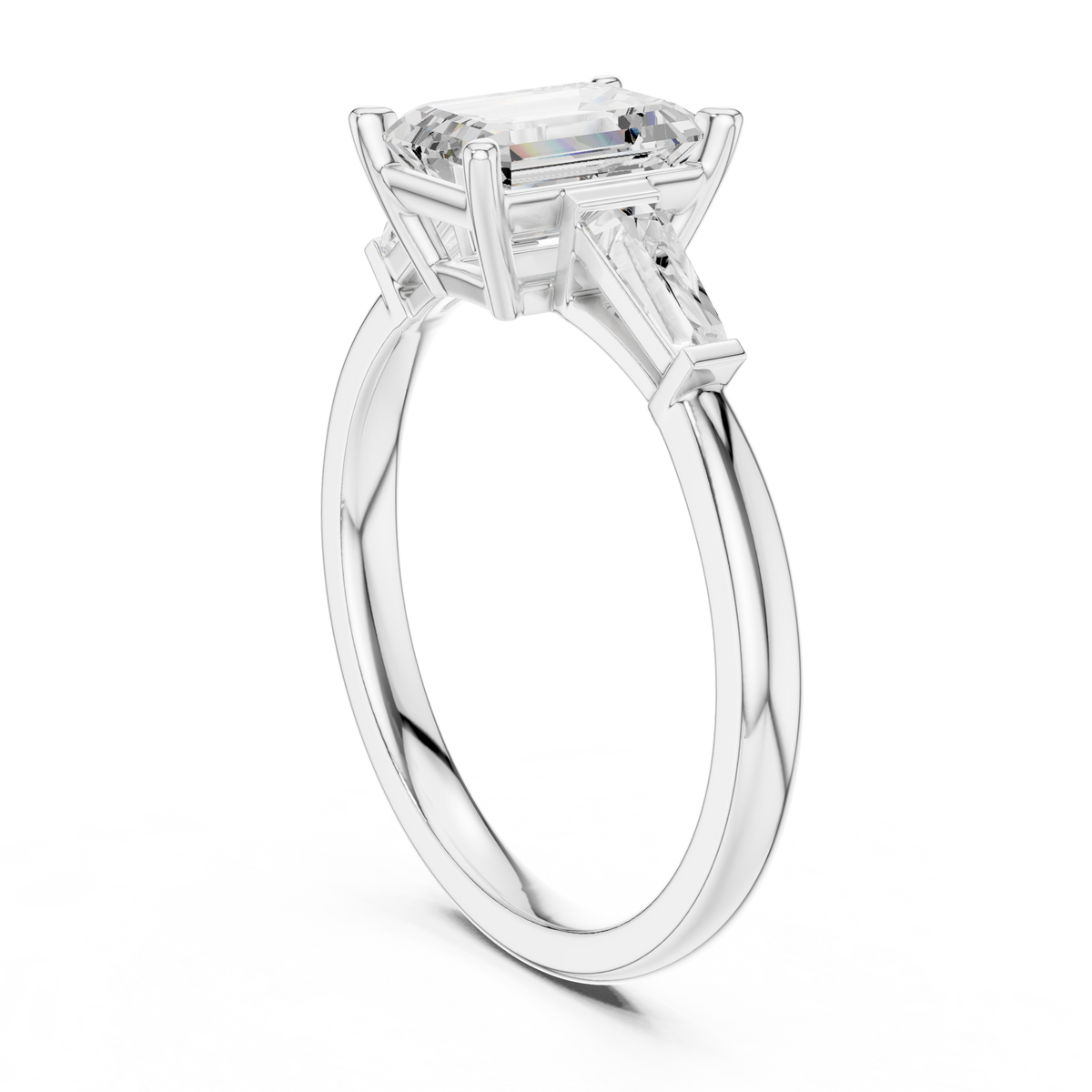 Emerald-Cut Three-Stone Ring with Tapered Baguettes