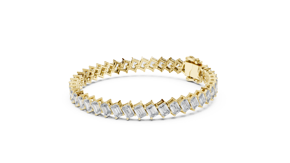 Gold bracelet with diamond accents on a white background