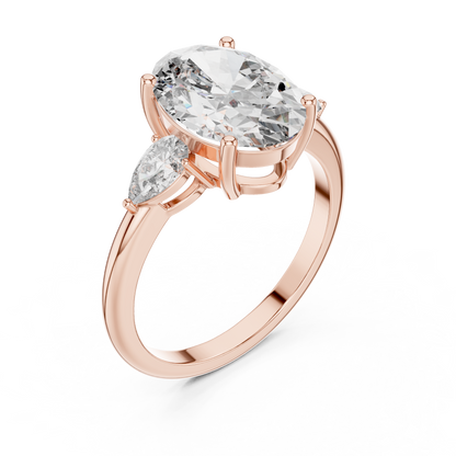 Oval Cut Diamond Three-Stone Ring with Pear Side Stones