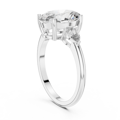 Oval Cut Diamond Three-Stone Ring with Pear Side Stones