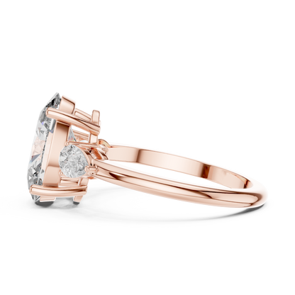 Oval Cut Diamond Three-Stone Ring with Pear Side Stones