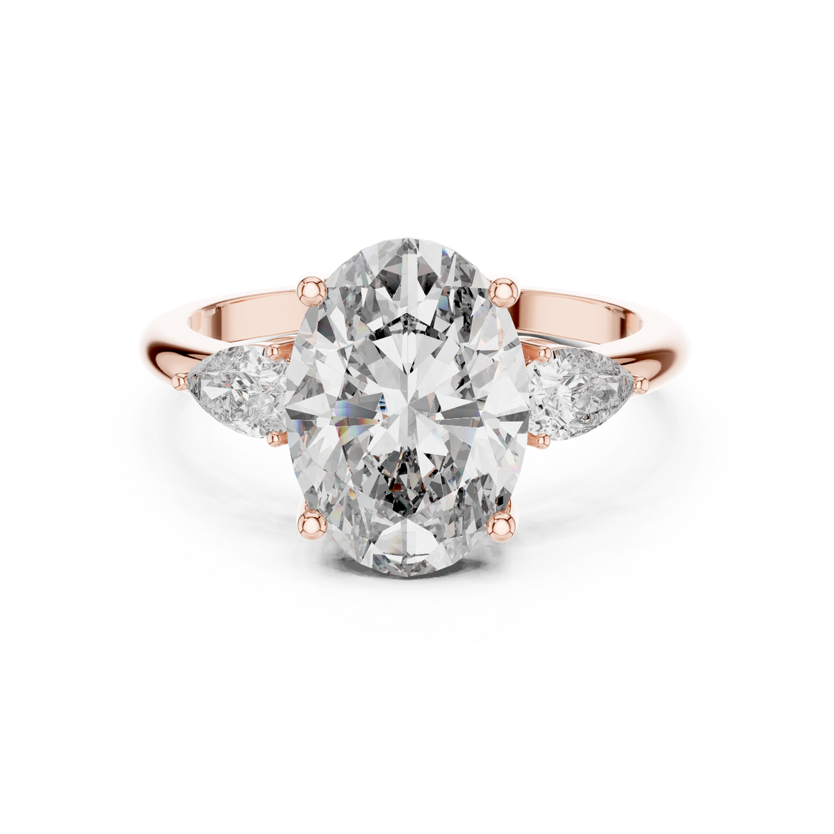 Oval Cut Diamond Three-Stone Ring with Pear Side Stones