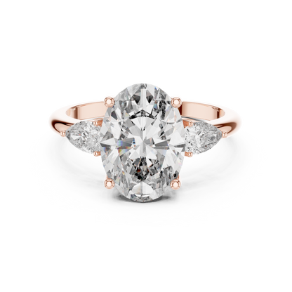 Oval Cut Diamond Three-Stone Ring with Pear Side Stones