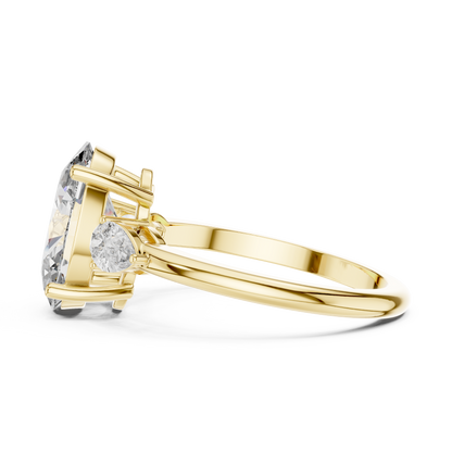 Oval Cut Diamond Three-Stone Ring with Pear Side Stones